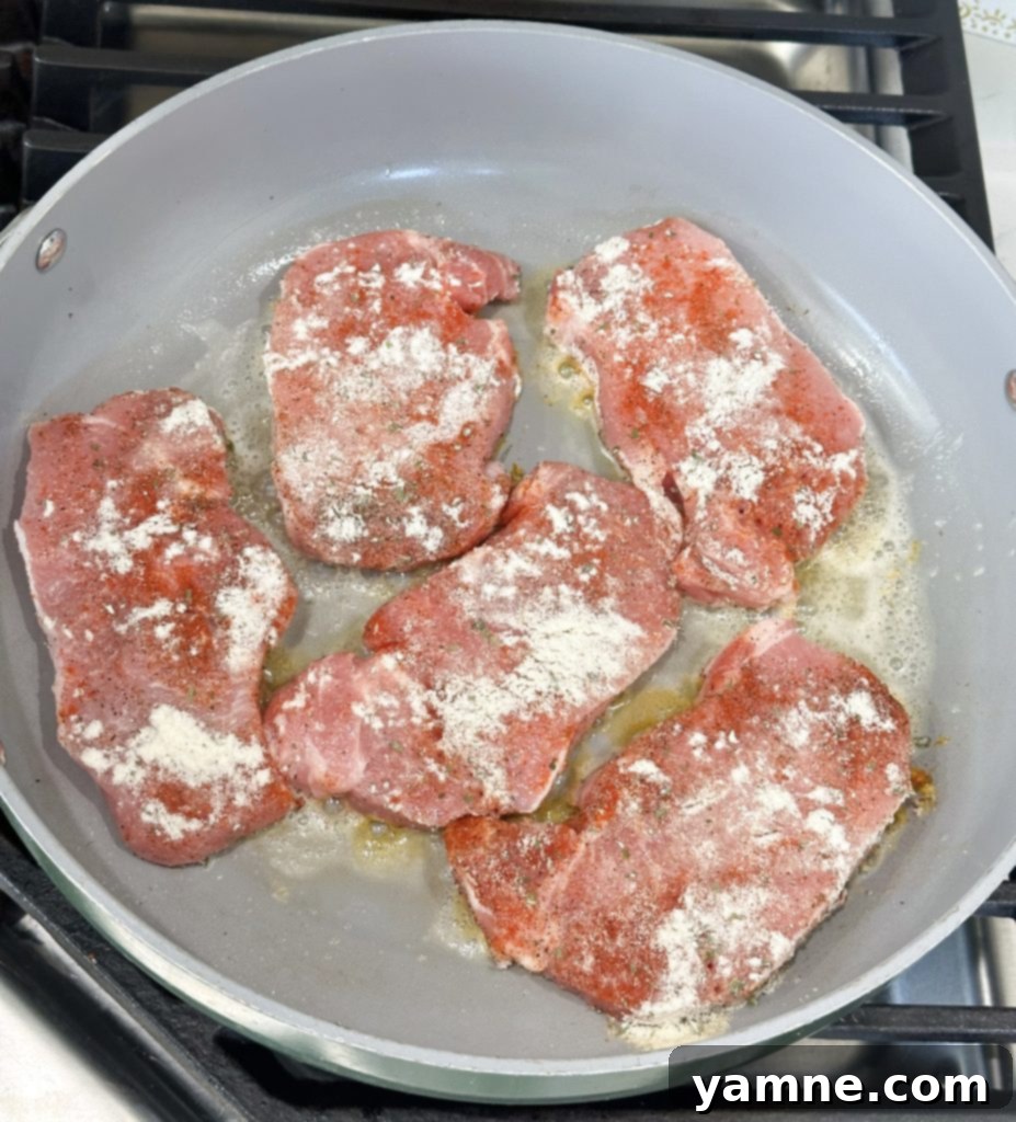 Seared ranch pork chops in skillet
