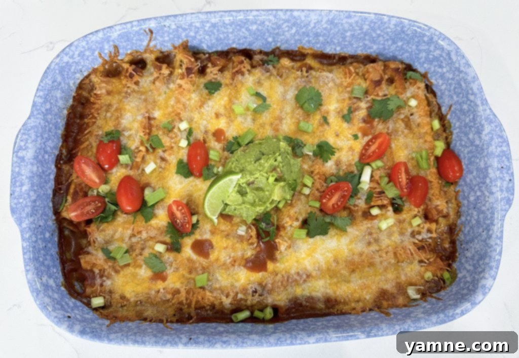 Finished Dump and Go Taquito Casserole with melted cheese and fresh toppings