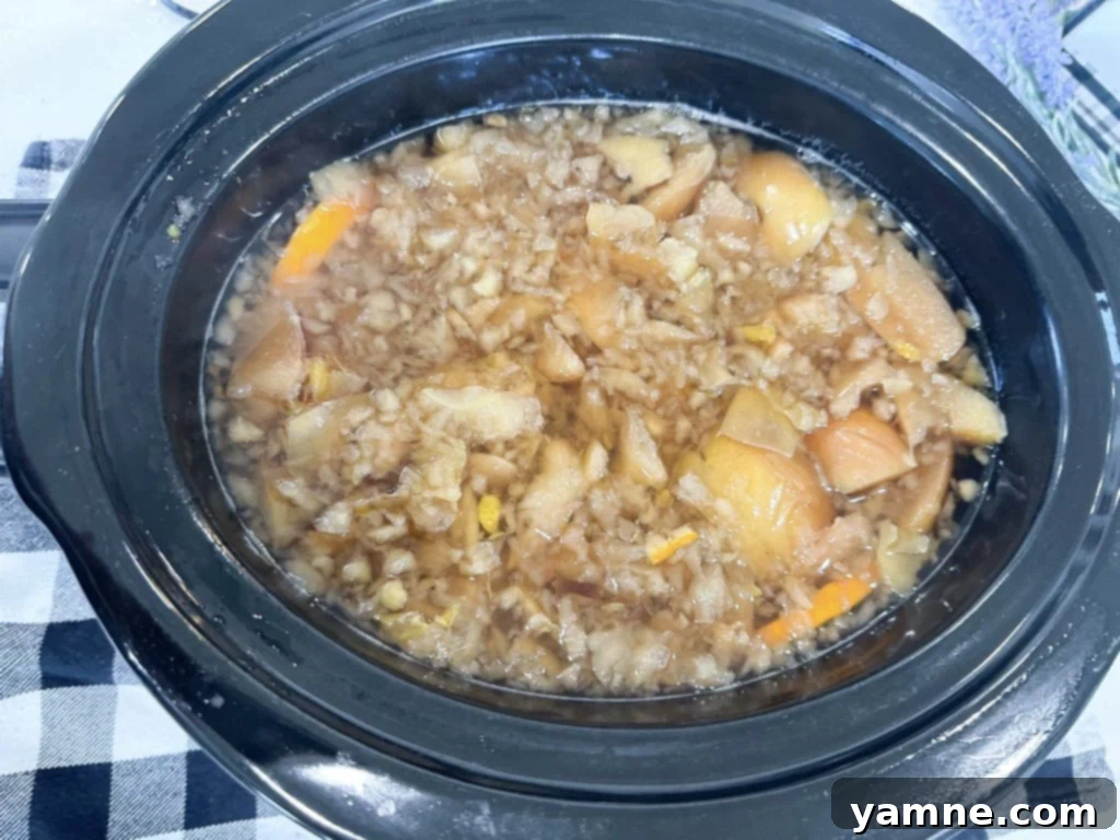 Spiced Apple Cider Simmered to Perfection 5 Straining apple cider