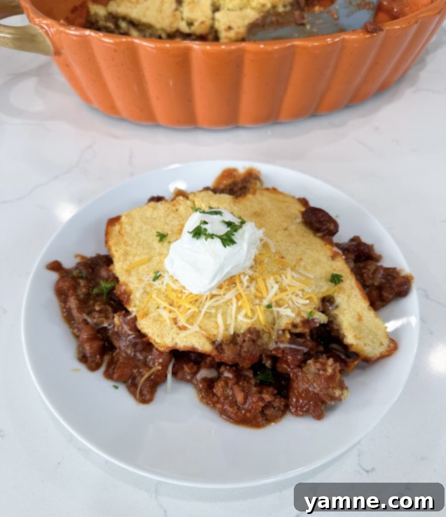 Julia Pacheco's 20 Best Easy 5 Ingredient Casserole Dinners 5 Comforting Chili Pot Pie Casserole with a golden cornbread topping.