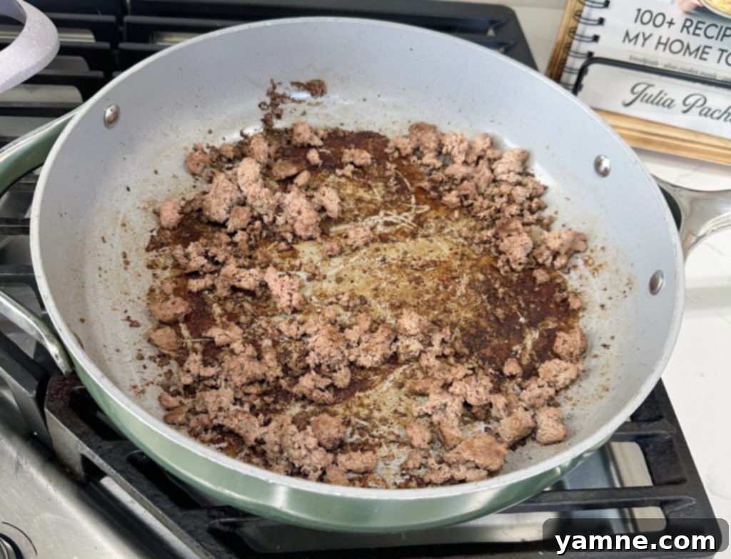 Preparing the macaroni for sloppy joe mac and cheese recipe