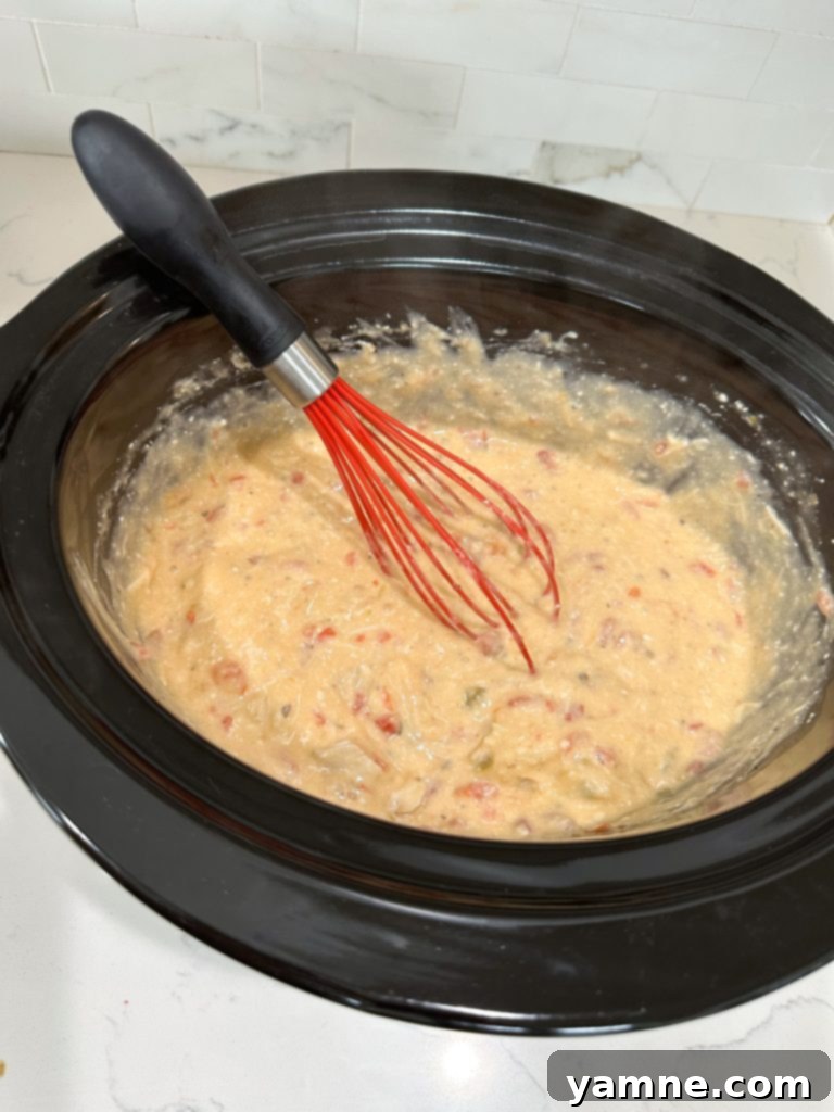Adding cheese and spaghetti to slow cooker chicken spaghetti