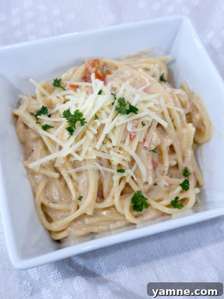 Slow cooker chicken spaghetti in a serving dish
