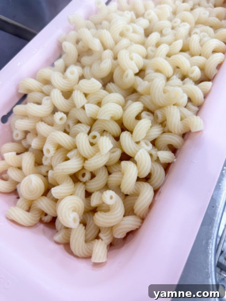 Golden Baked Macaroni Delight 3 Cooking pasta for baked mac and cheese