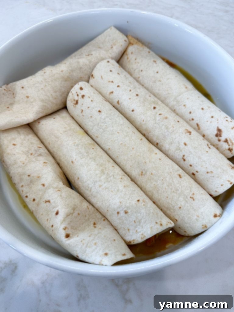 Honey-Glazed Lime Chicken Enchiladas 4 Filling flour tortillas with honey lime chicken mixture
