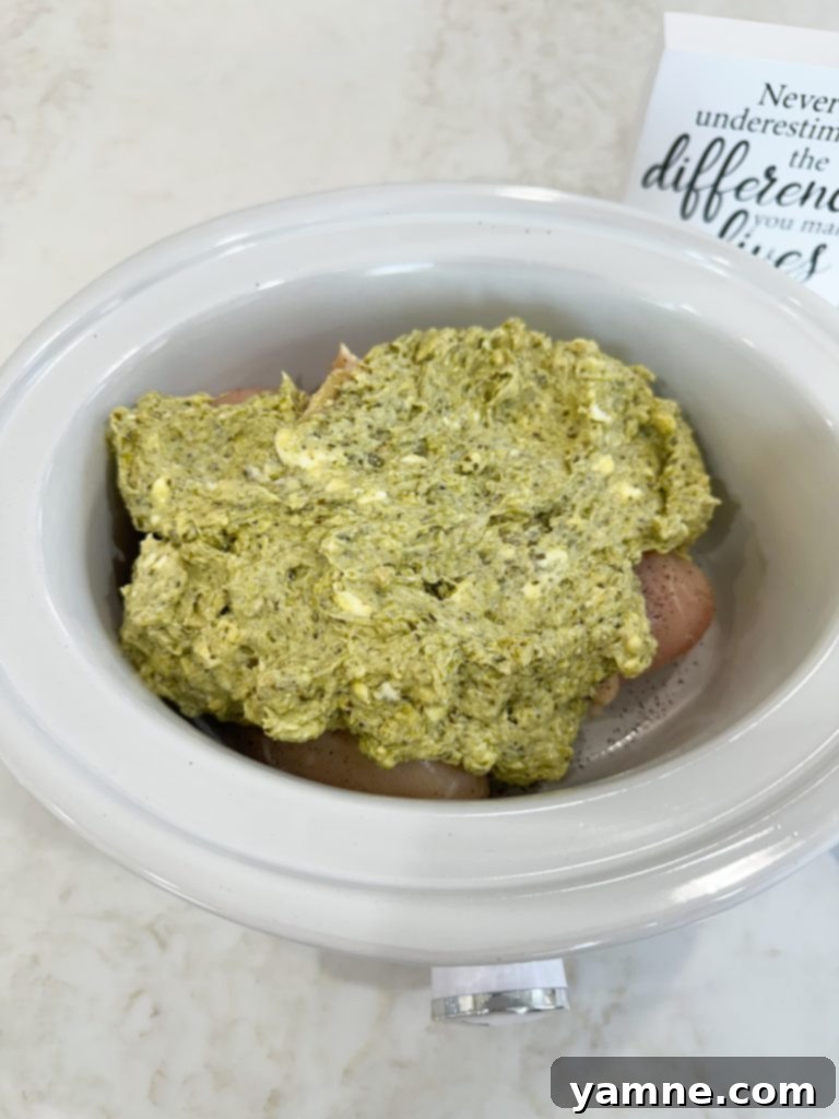 easy slow cooker pesto chicken cooking
