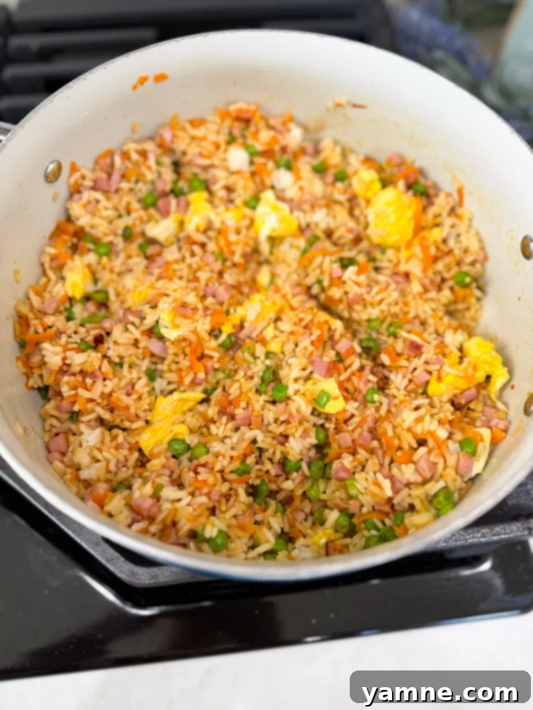 Fry rice with vibrant veggies and ham