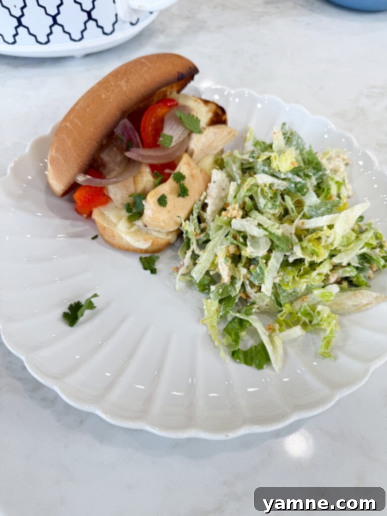 Simple Crockpot Chicken Philly Cheesesteak Sandwiches ready to be enjoyed