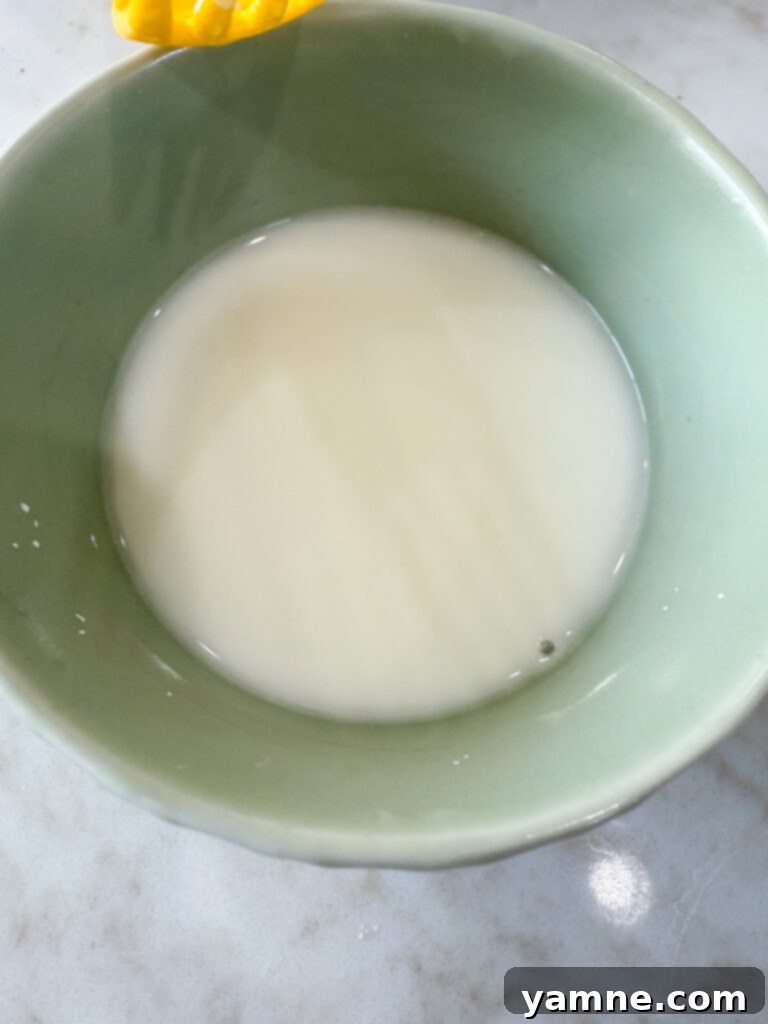 Easy sauce thickener being whisked in a small bowl