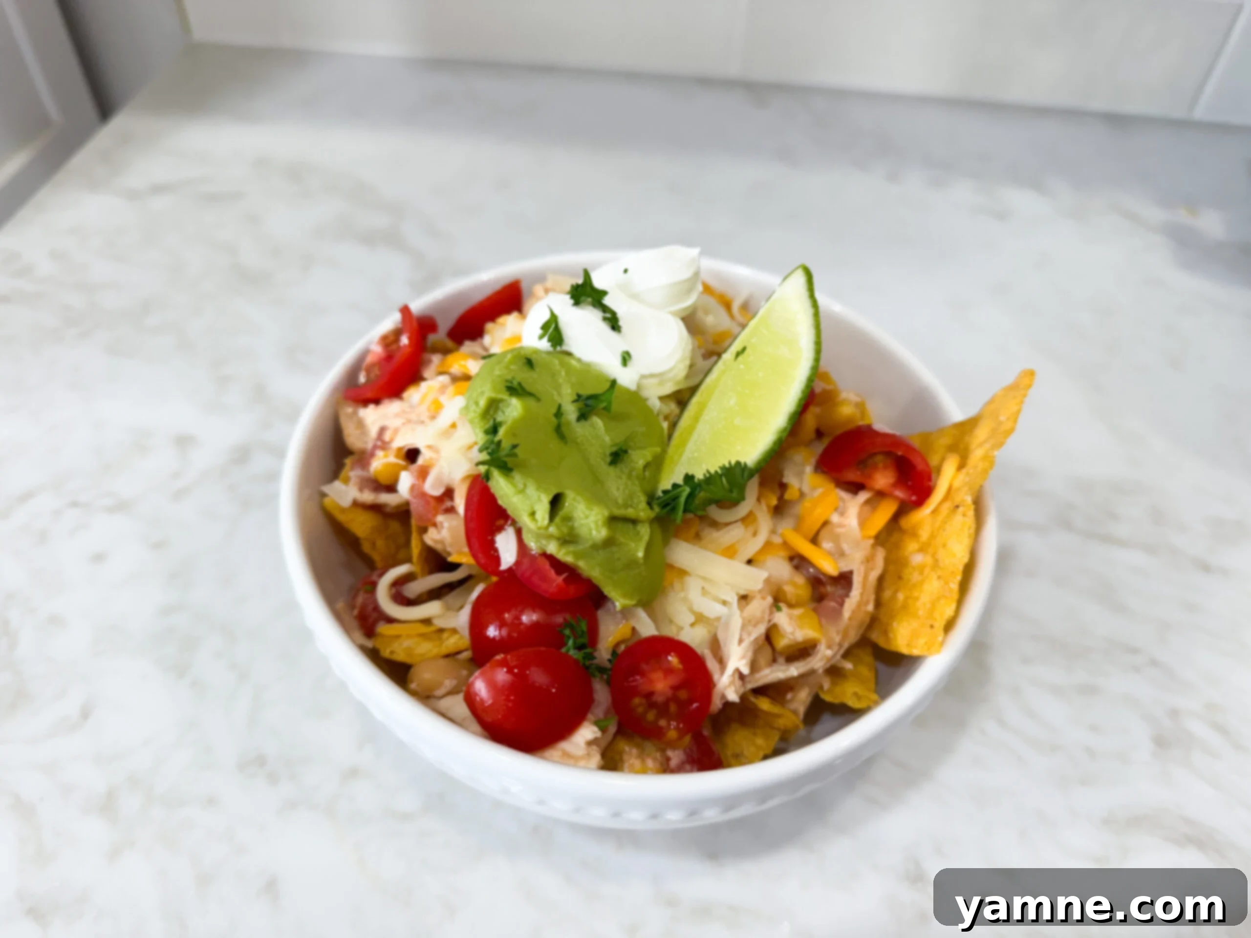 Slow Cooker Fiesta Chicken – shredded chicken in a creamy, spicy sauce