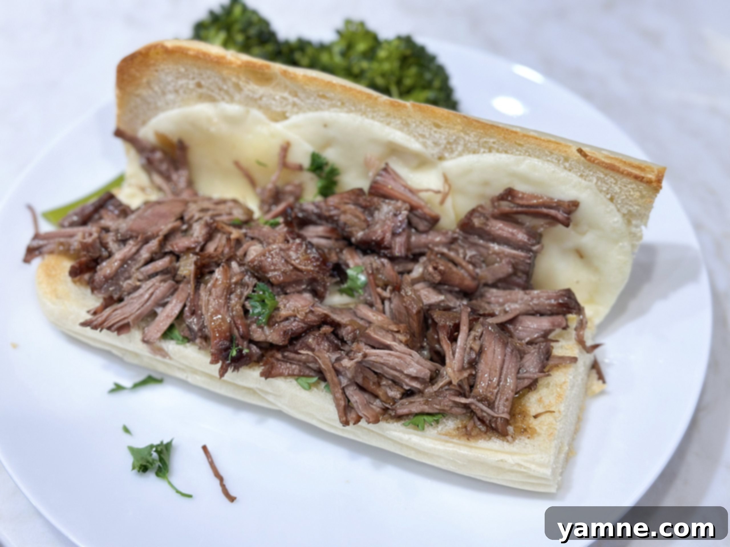 Easy Slow Cooker French Dip Roast Sandwiches with au jus