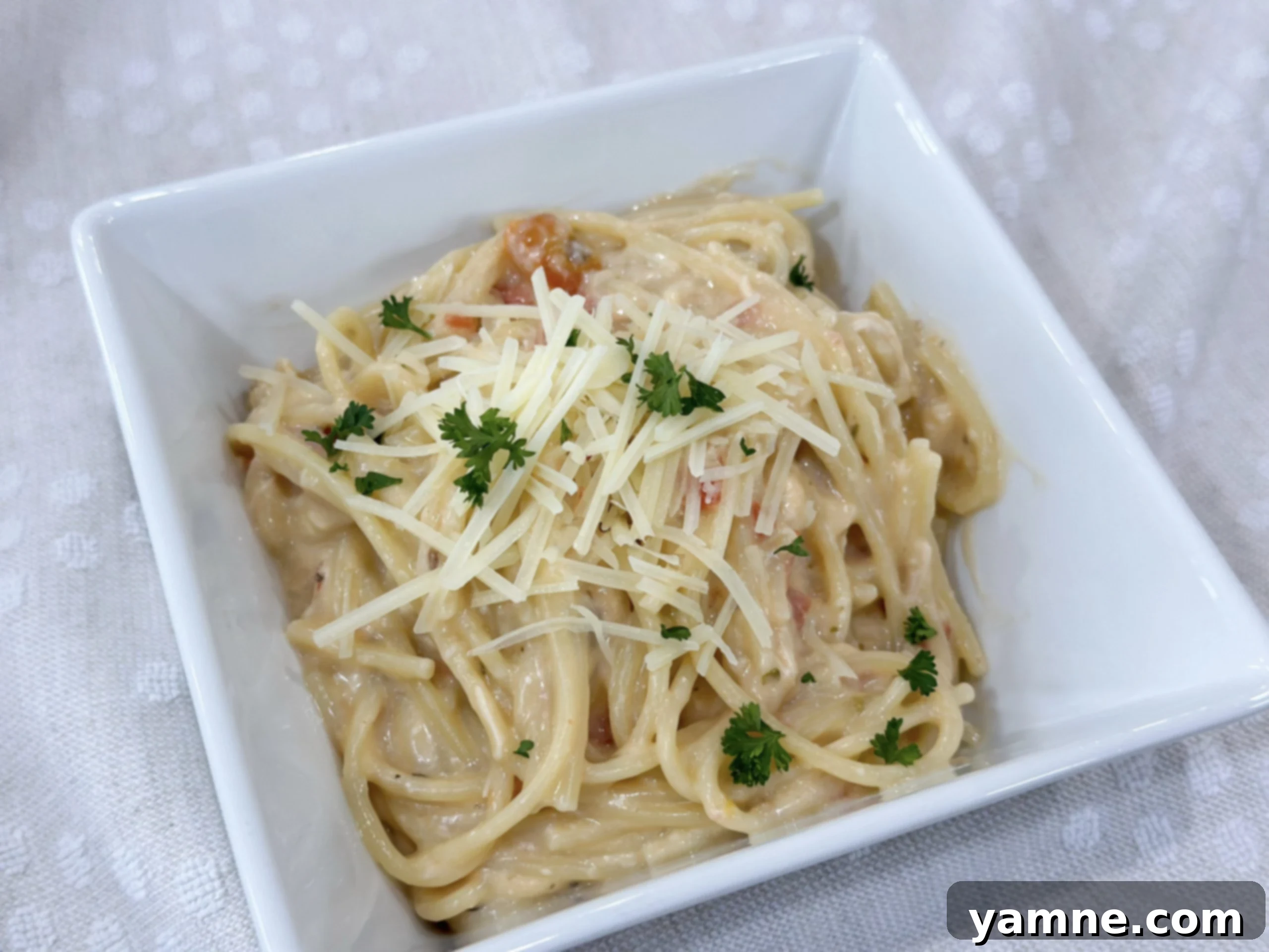 Slow Cooker Chicken Spaghetti, a creamy and easy weeknight dinner