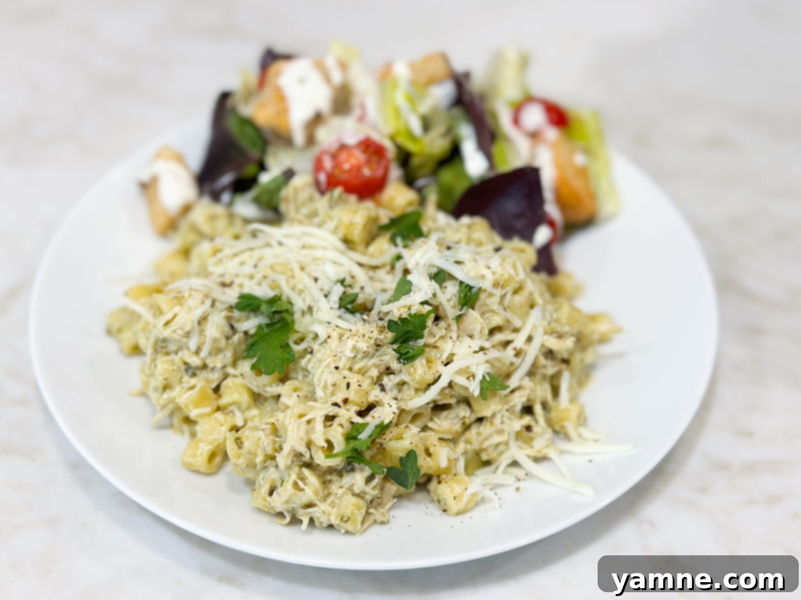 Easy Slow Cooker 3 Ingredient Pesto Chicken, a creamy and flavorful dish