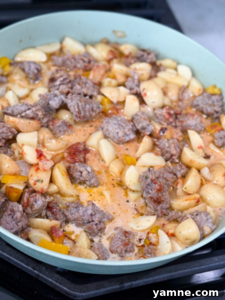 Add cream to Italian Sausage and Potato Skillet