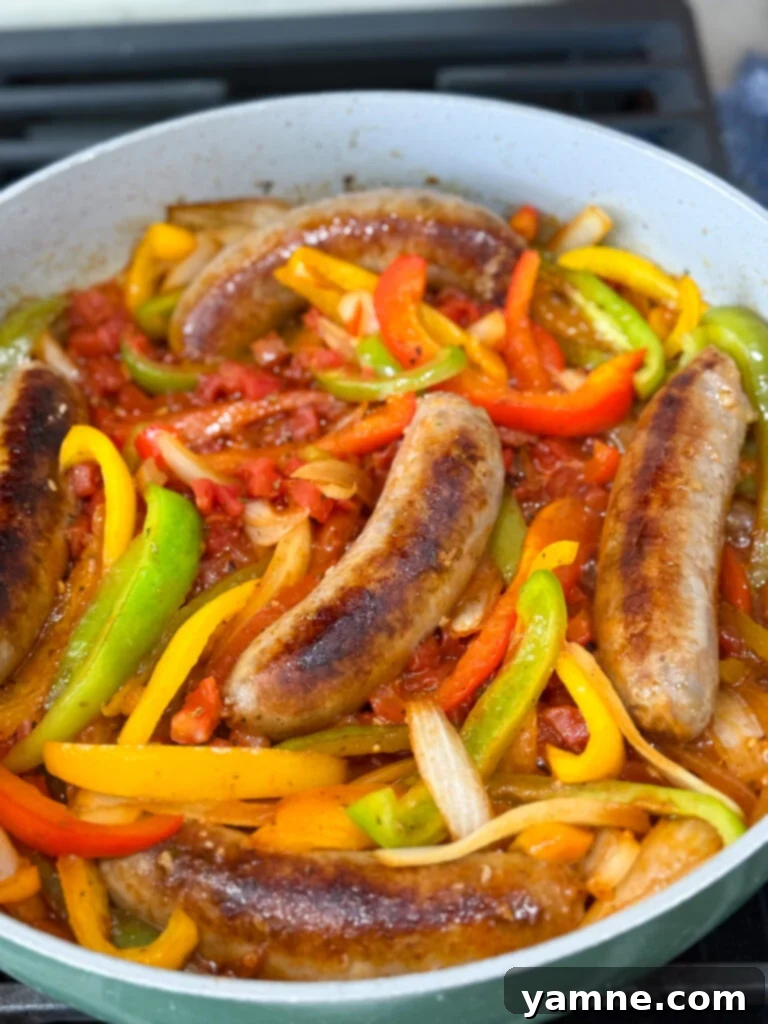 Add sausages back to the pan