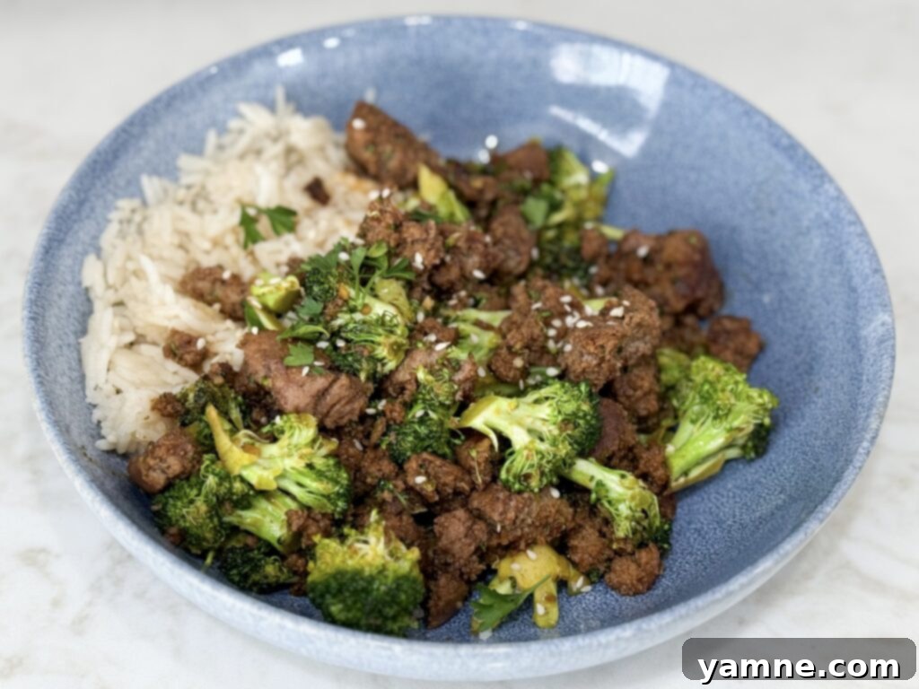 Cook Sweet & Spicy Turkey and Broccoli Bowl Recipe in a blue bowl on a white counter