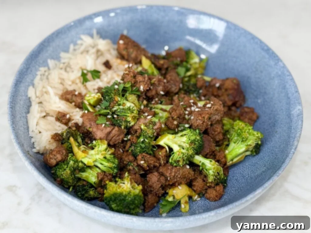 Effortless Ground Turkey Recipes: Quick & Delicious Meals 6 Cook Sweet & Spicy Turkey and Broccoli Bowl Recipe in a blue bowl on a white counter