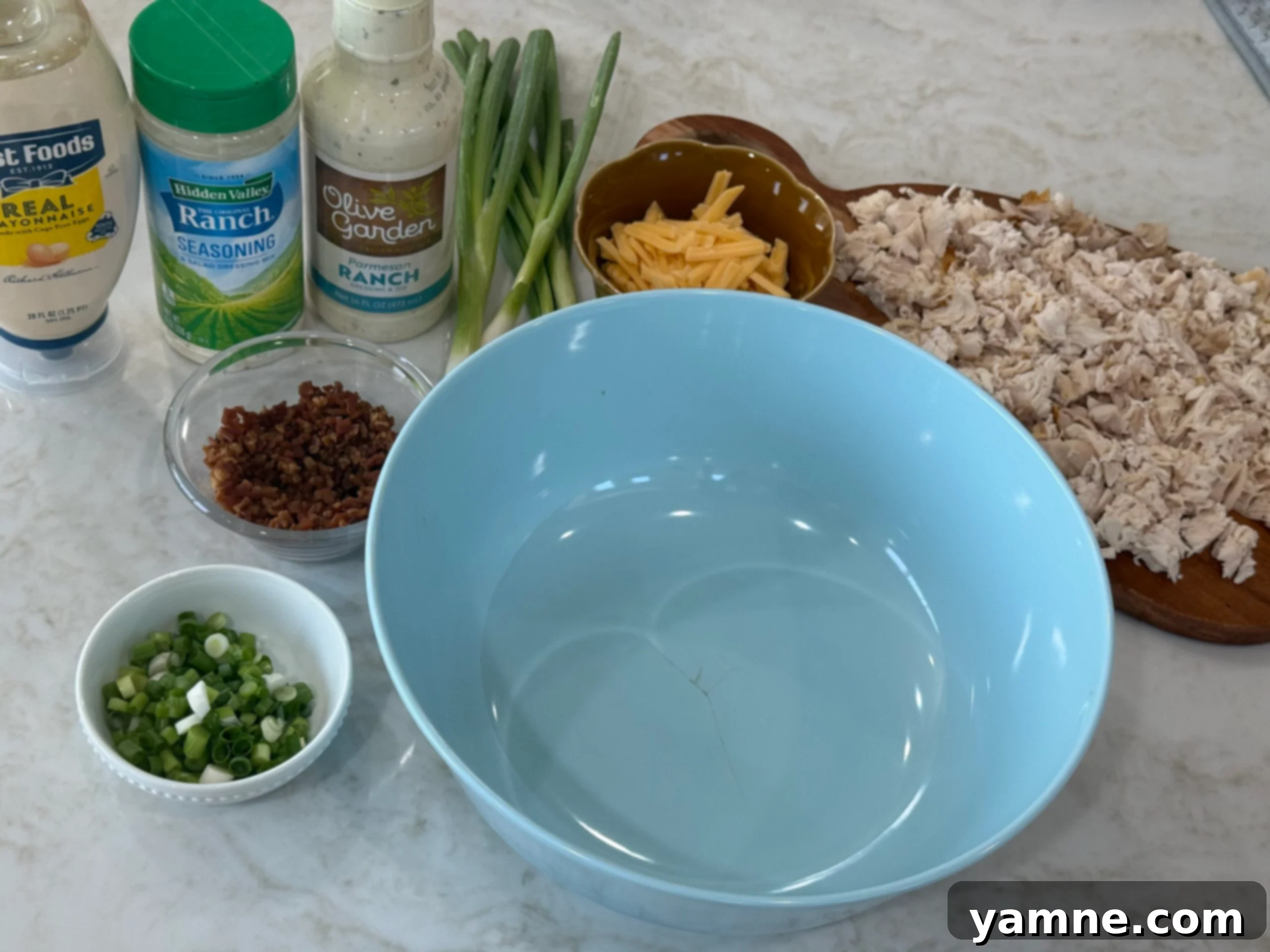 Bacon Ranch Chicken Salad served on a plate with fresh greens