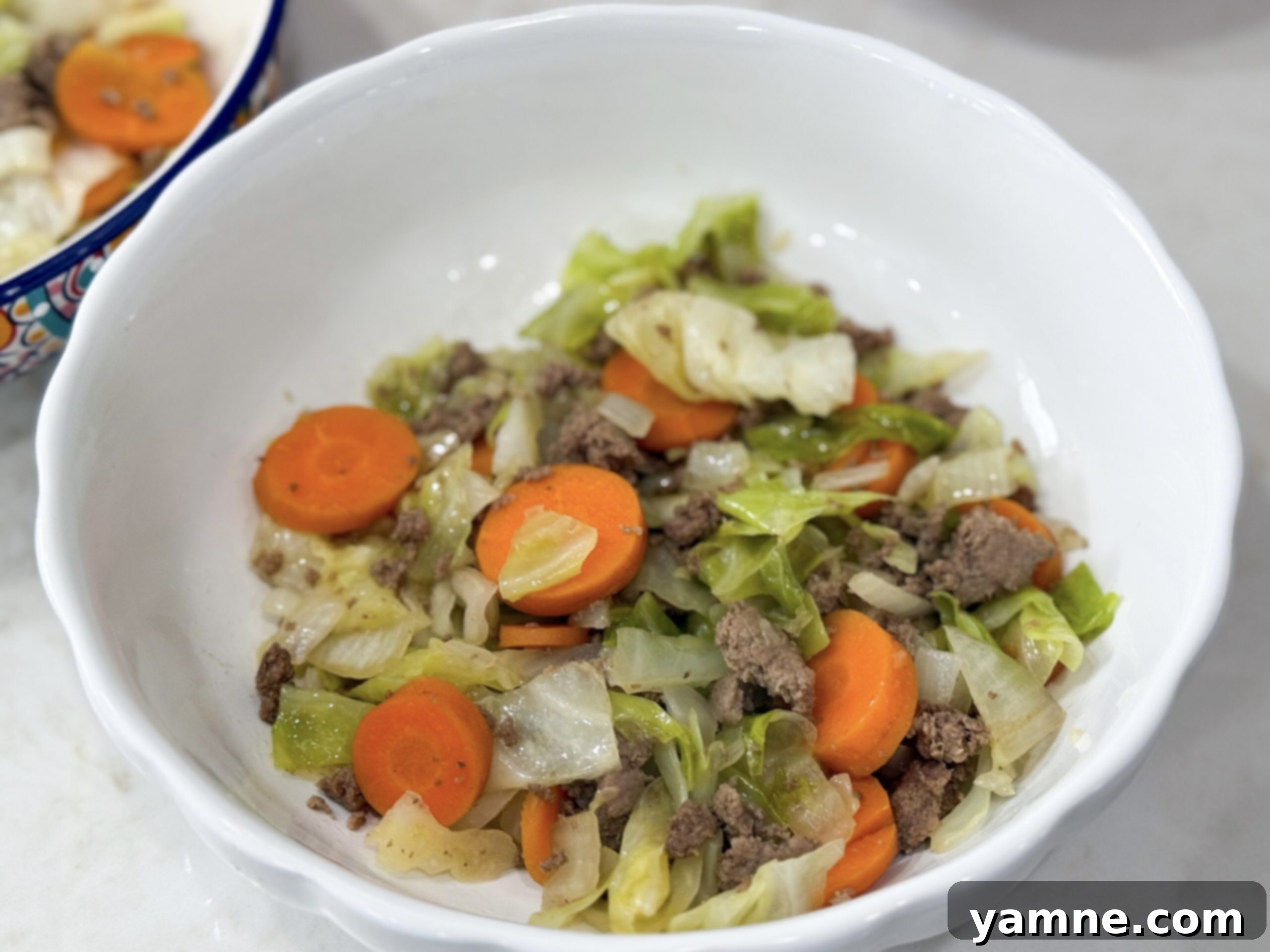 Ground turkey stir-fry in a bowl. See meal plan for recipe.