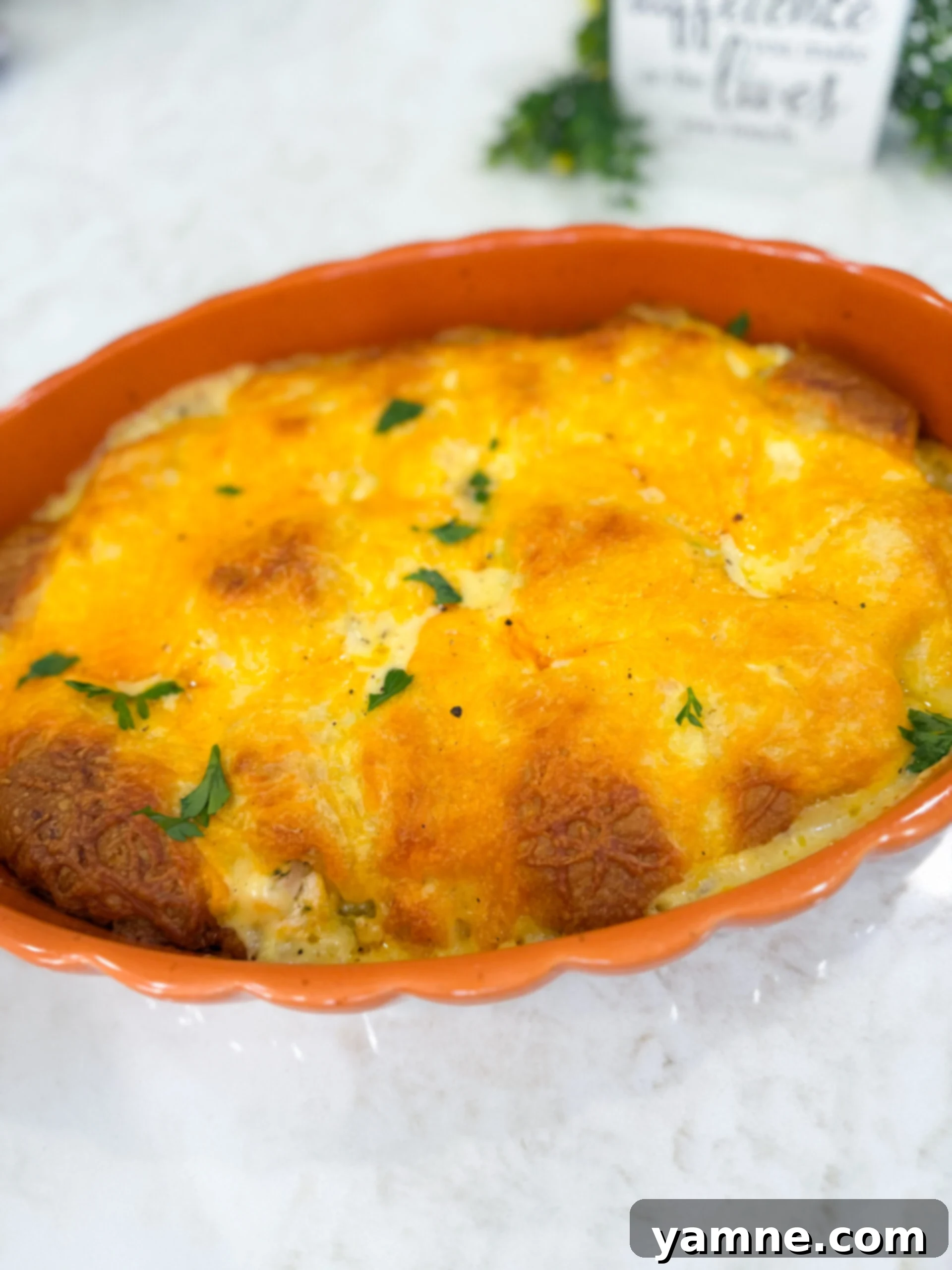 Flaky Cheesy Chicken and Broccoli Bake 10 The finished cheesy chicken crescent roll casserole, baked until golden brown and bubbly, fresh out of the oven.