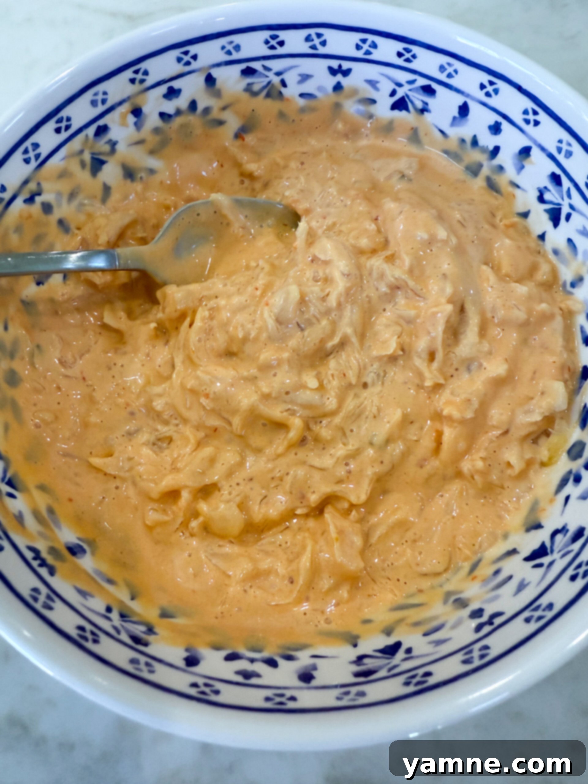 Pastrami Swirl Bake 7 Mixing sauerkraut and Thousand Island dressing