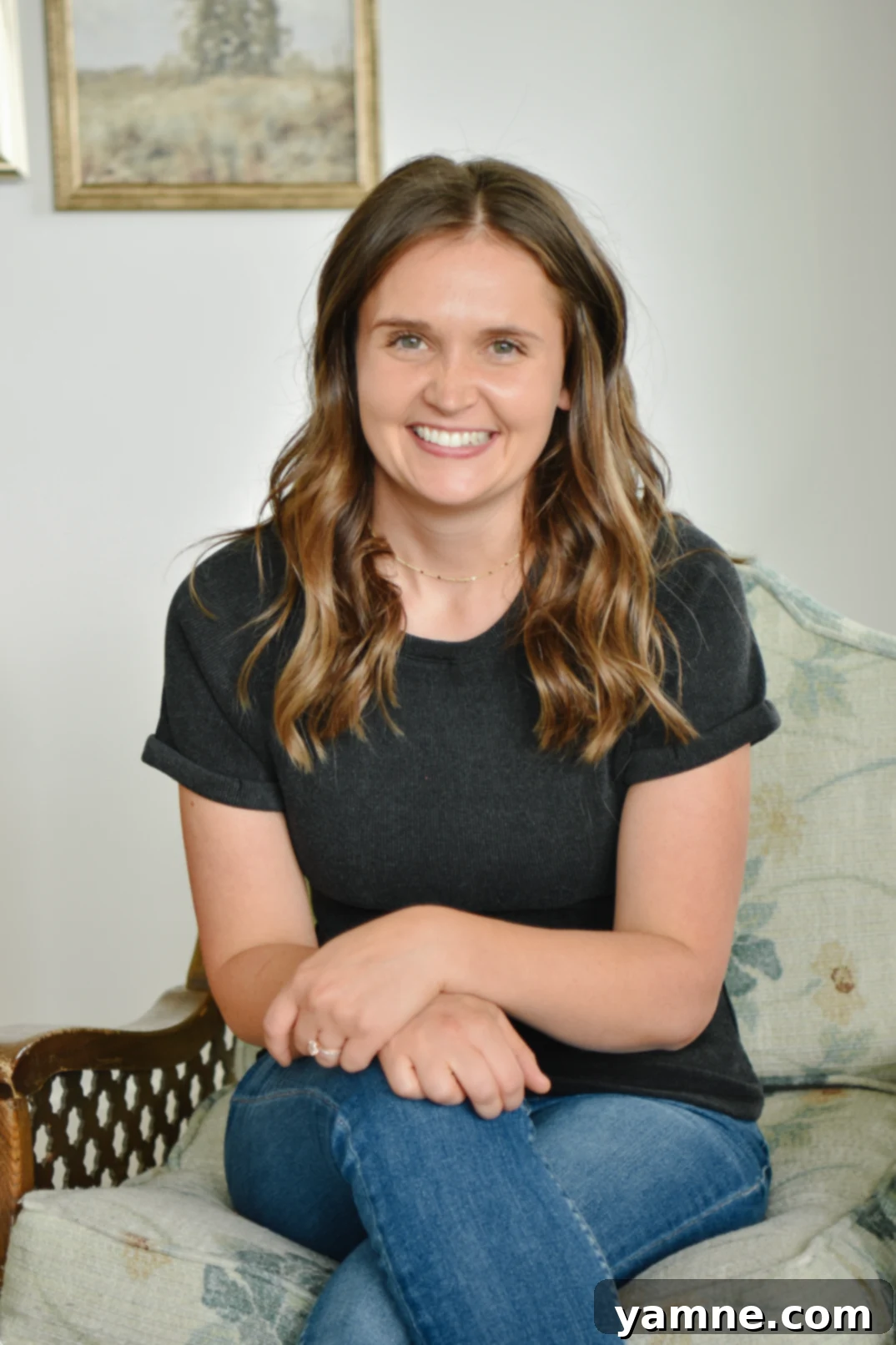 Chef Julia Pacheco smiling, promoting her cooking channel.