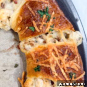 Golden baked crescent ring stuffed with chicken, bacon, and Alfredo sauce