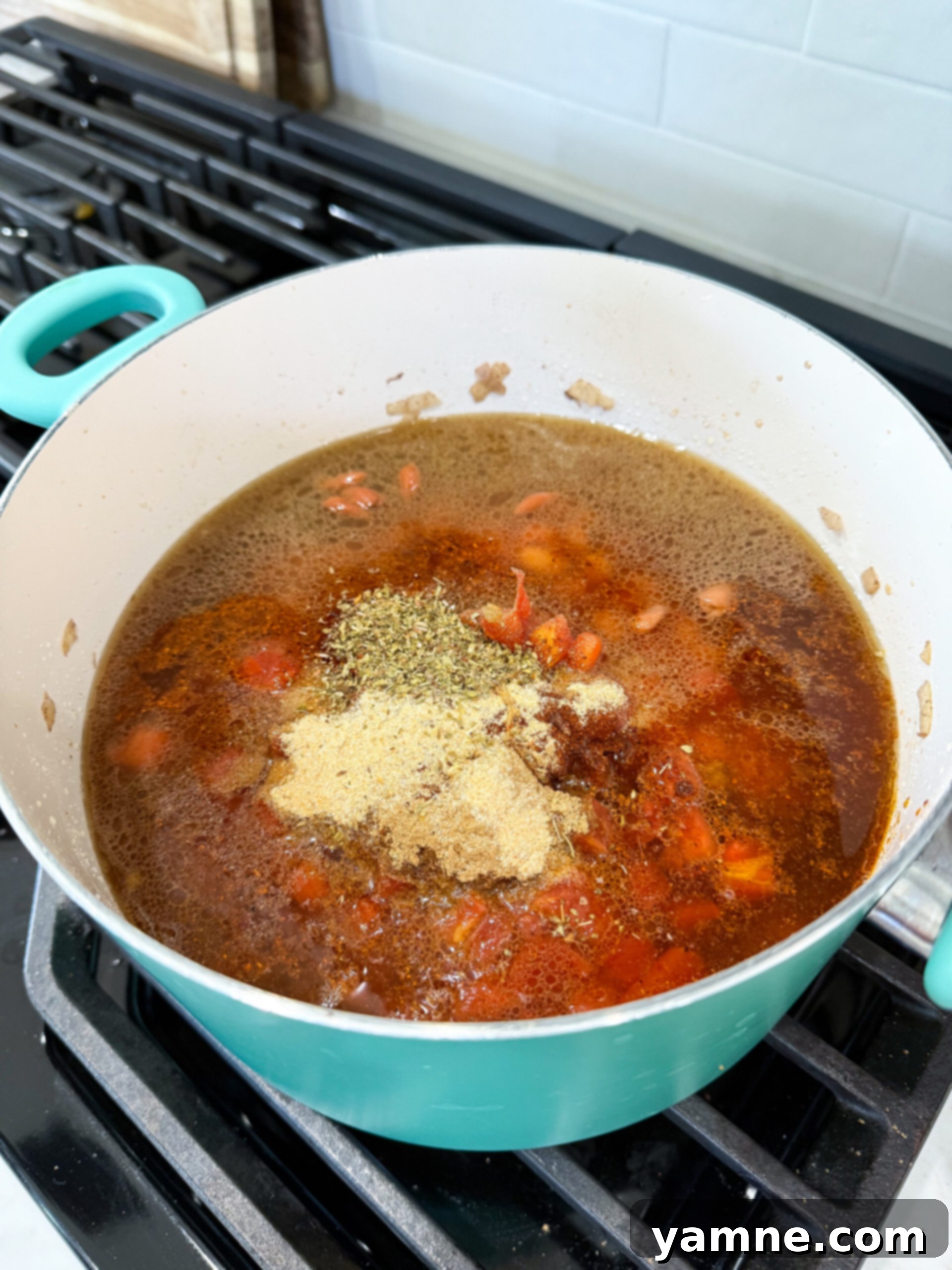 Browning ground beef in a pot