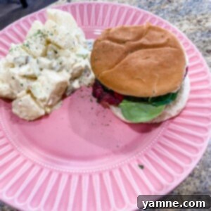 Burger Bliss 2 Delicious homemade hamburger patty on a plate