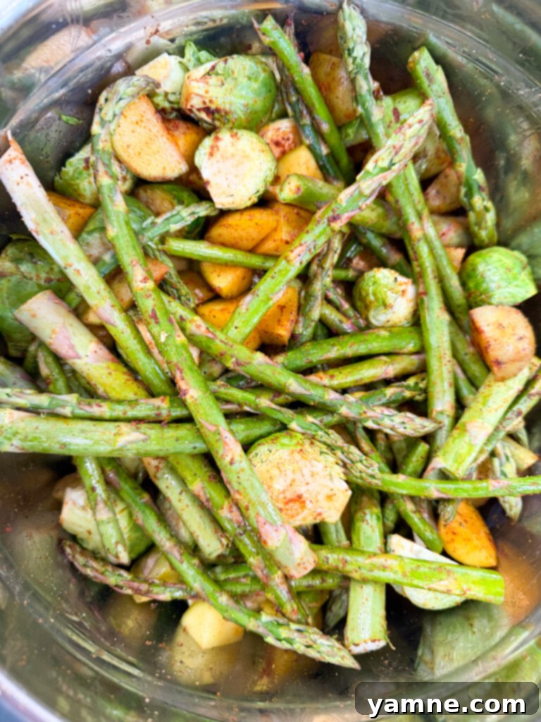 sheet pan pork tenderloin seasoned vegetables