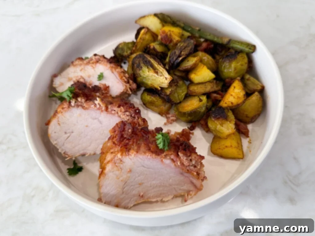 the best sheet pan pork tenderloin served with vegetables