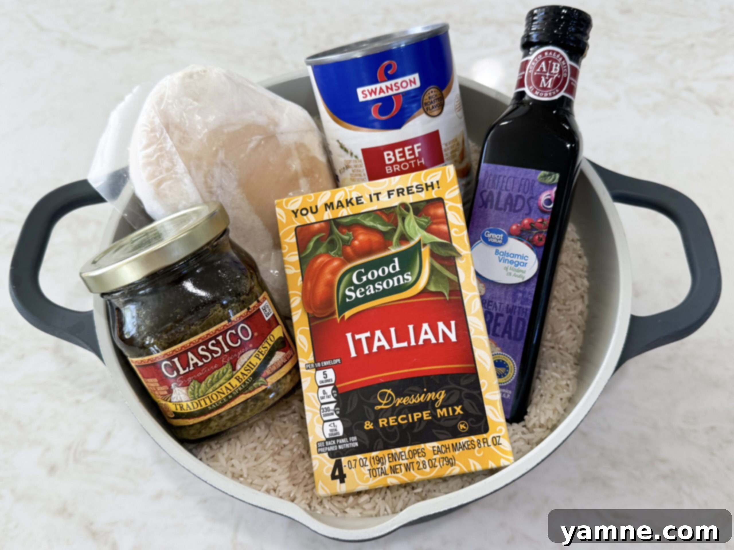 Caprese Chicken and Rice whole ingredients sitting in a pot.