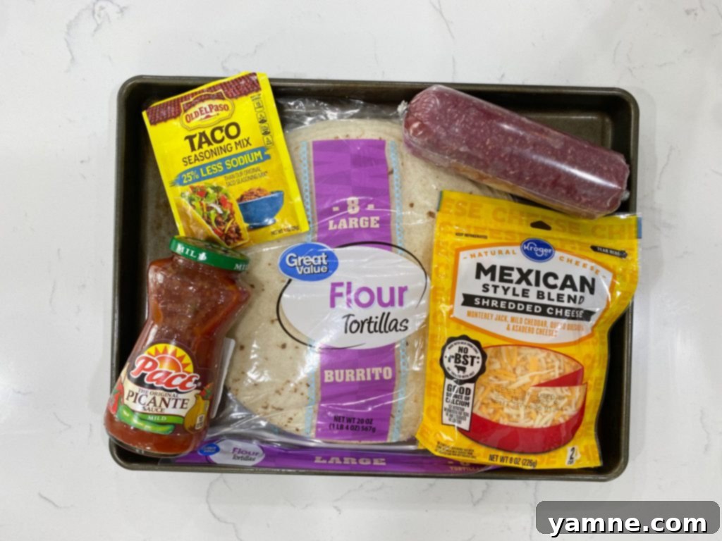 Crispy, golden-brown Sheet Pan Loaded Quesadillas sliced and ready to serve, showing off a cheesy, meaty interior, perfect for an easy family dinner.