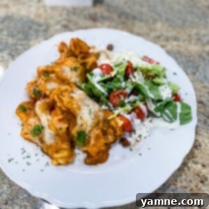 Cheesy Tortellini Bake 2 A delicious, cheesy baked tortellini casserole, bubbling hot from the oven.