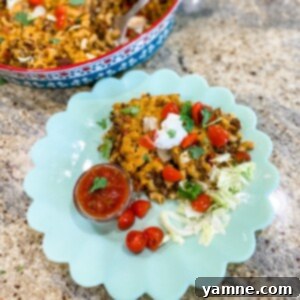 Fiesta Taco Pasta 2 Delicious One-Pot Cheesy Taco Pasta Bake with ground beef, pasta, and melted cheddar cheese