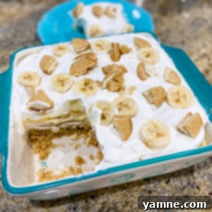 Delicious No-Bake Banana Cream Bars with whipped topping and cookie crumbs