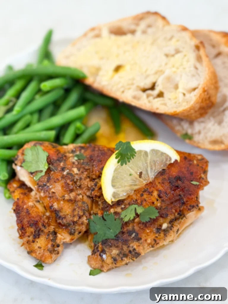 Beautifully cooked seasoned lemon chicken thighs, ready for serving or storage