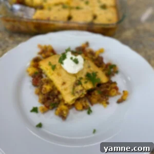 Zesty Southwest Cornbread Bake 2 Delicious Mexican Cornbread Casserole with a golden cornbread topping