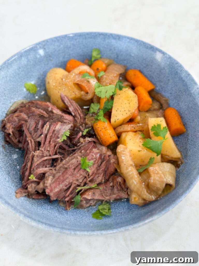 Perfect Slow Cooker Pot Roast 2 Perfectly cooked slow cooker pot roast with tender beef and vegetables