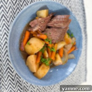 Perfect Slow Cooker Pot Roast 6 A beautiful slow cooker pot roast, ready to be served