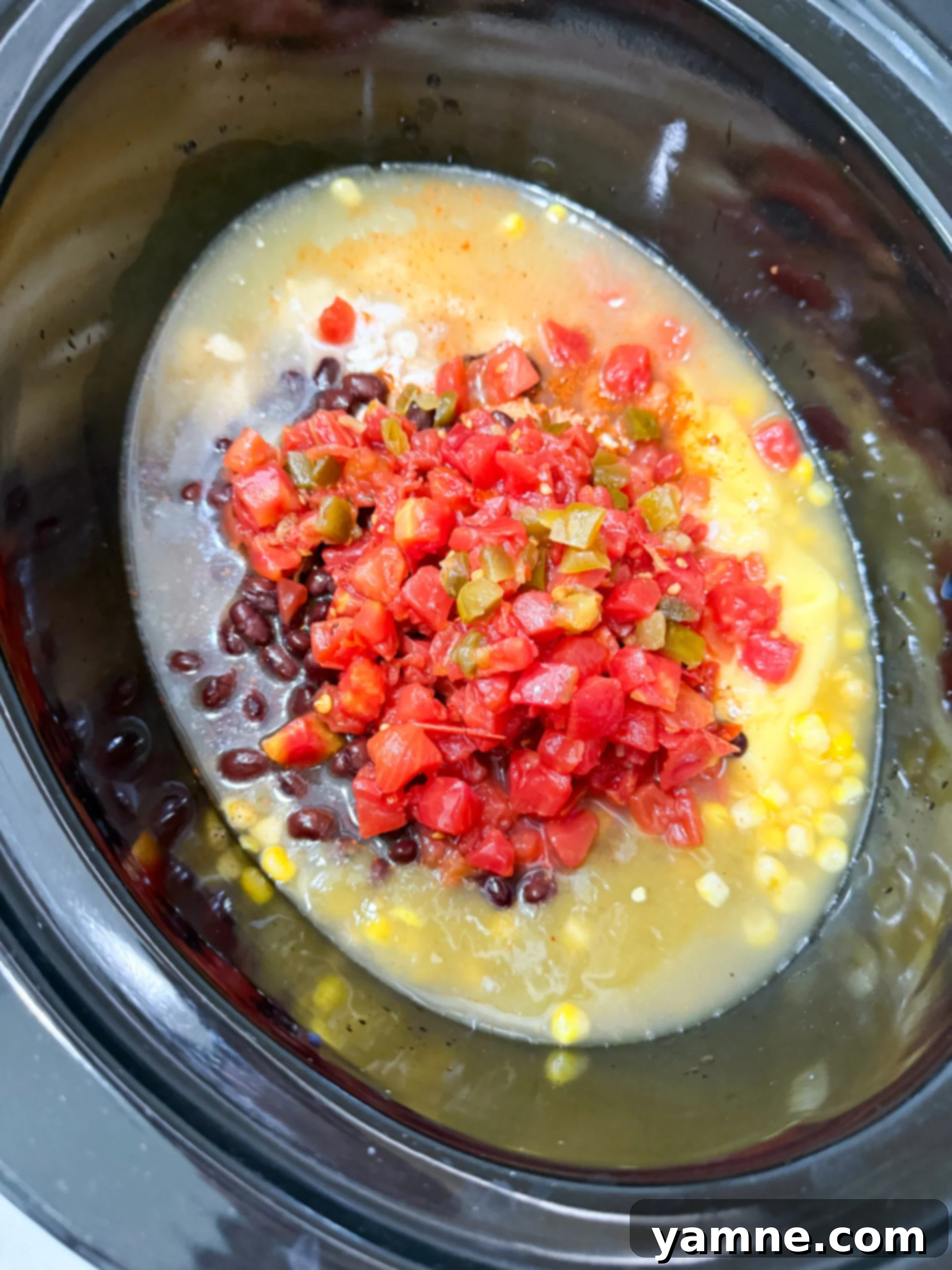 All 8 cans opened and poured into slow cooker