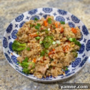 Delicious Teriyaki Chicken Rice Bowl with fresh vegetables and sesame seeds