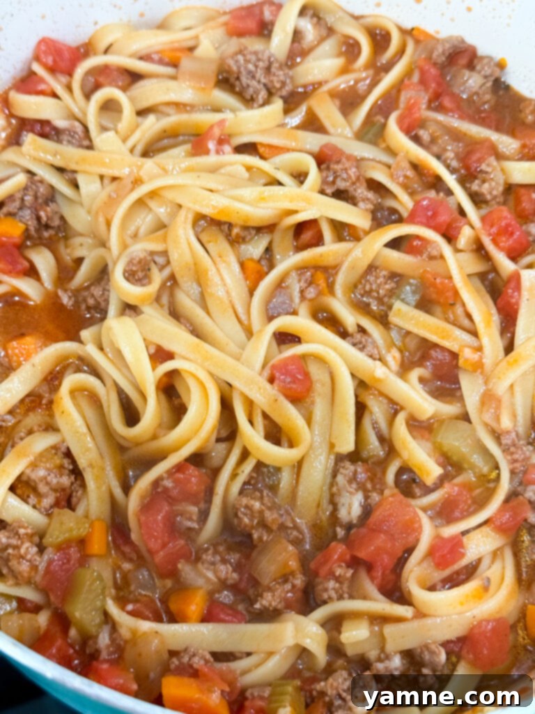 Adding parmesan cheese