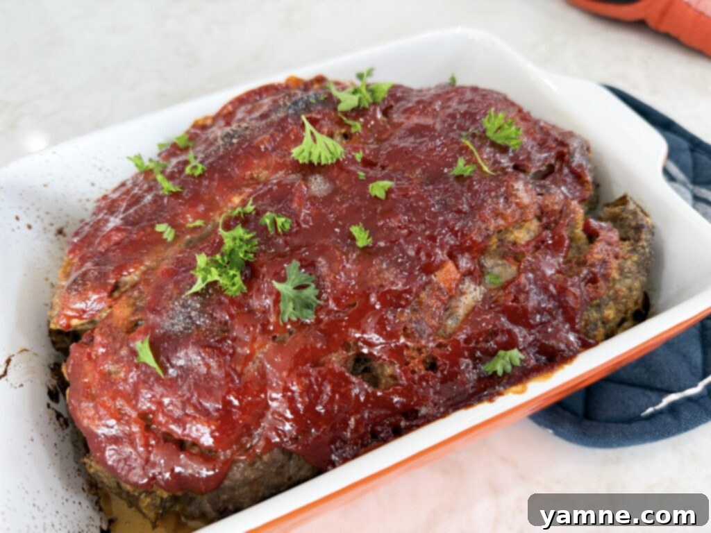 Baked meatloaf, golden brown with caramelized glaze, fresh from the oven