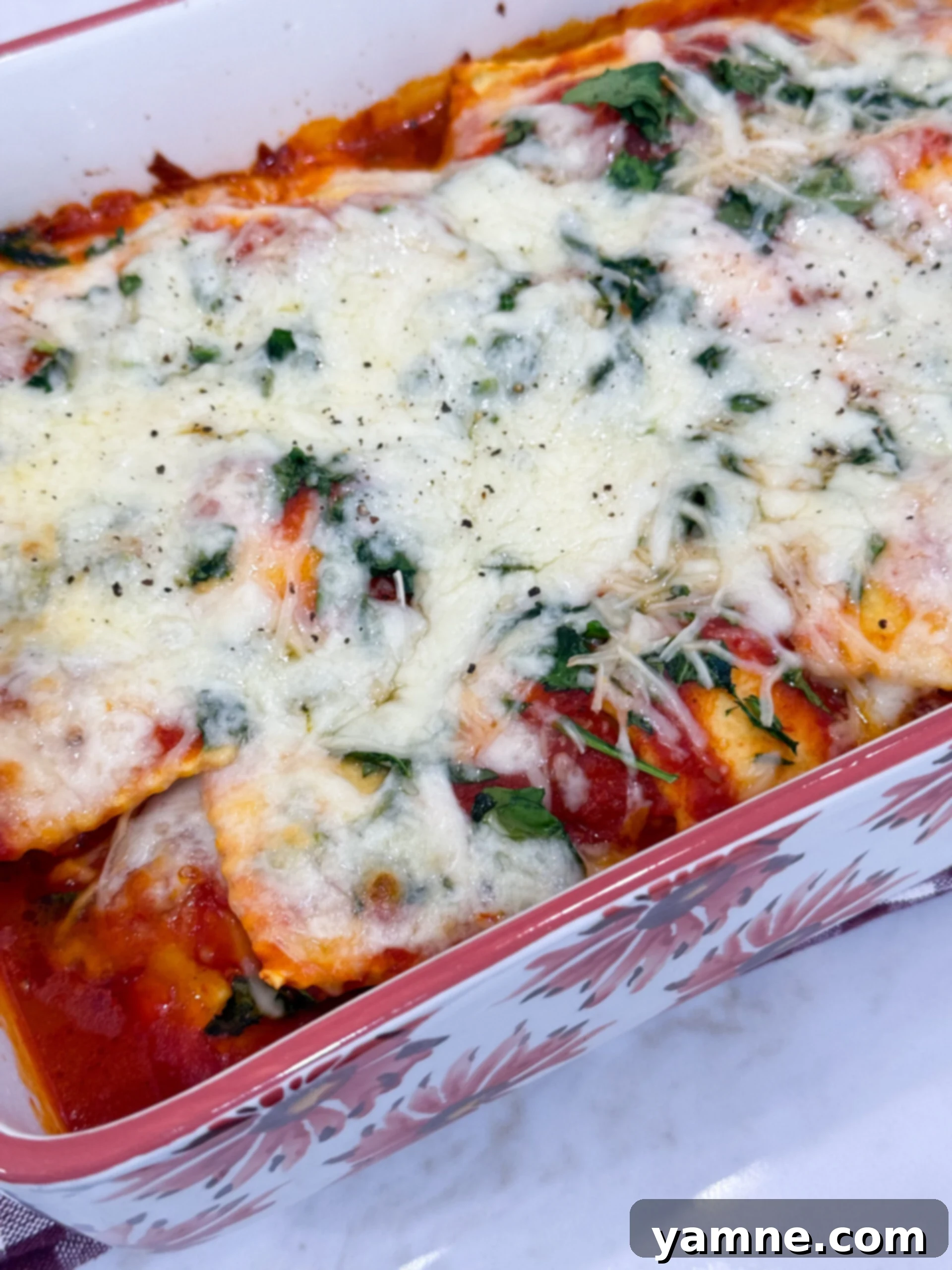 Cheesy Ravioli Casserole 8 Baked ravioli casserole with melted cheese
