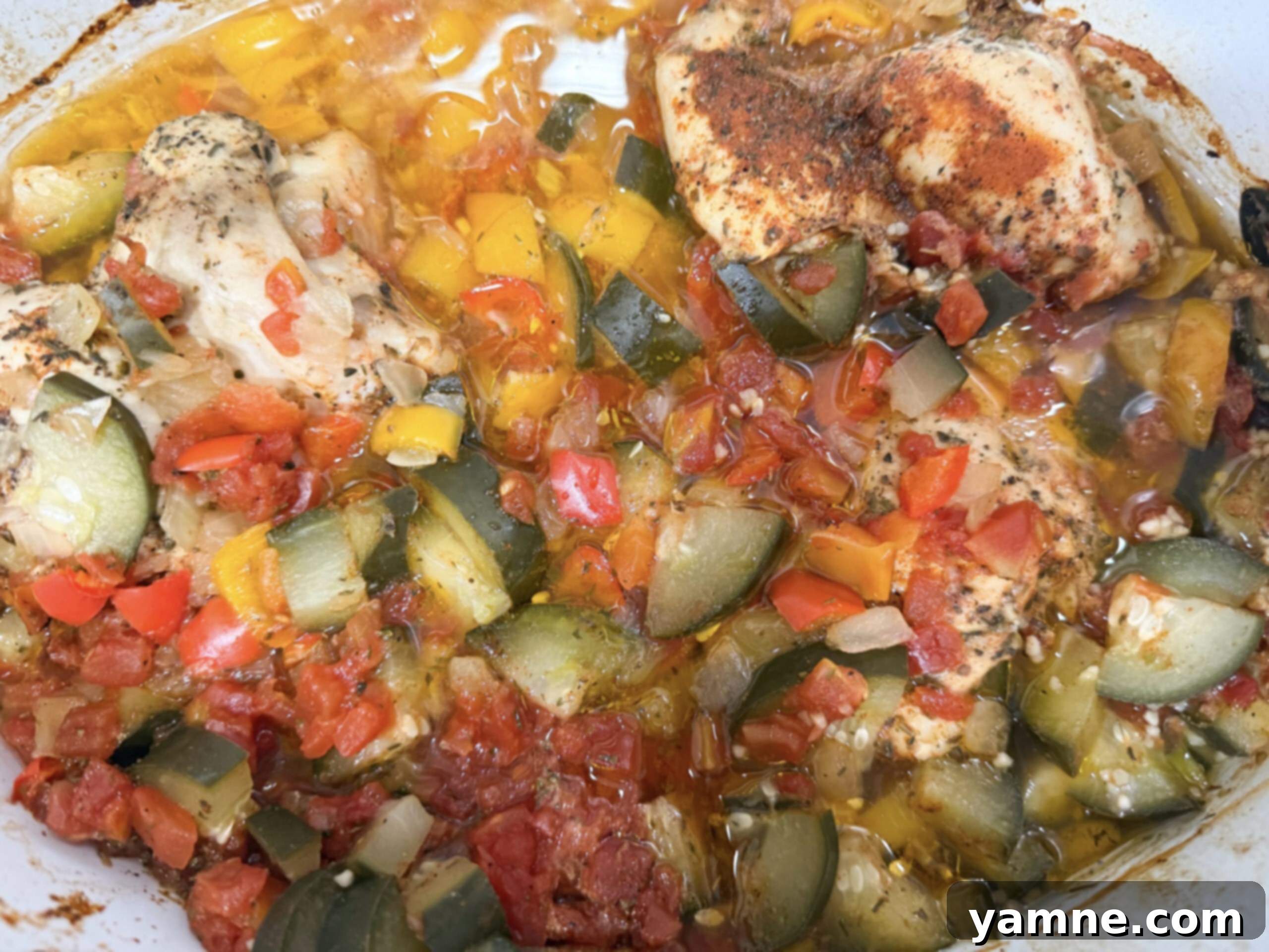 The cooked chicken and vegetables, looking tender and delicious after slow cooking to perfection.
