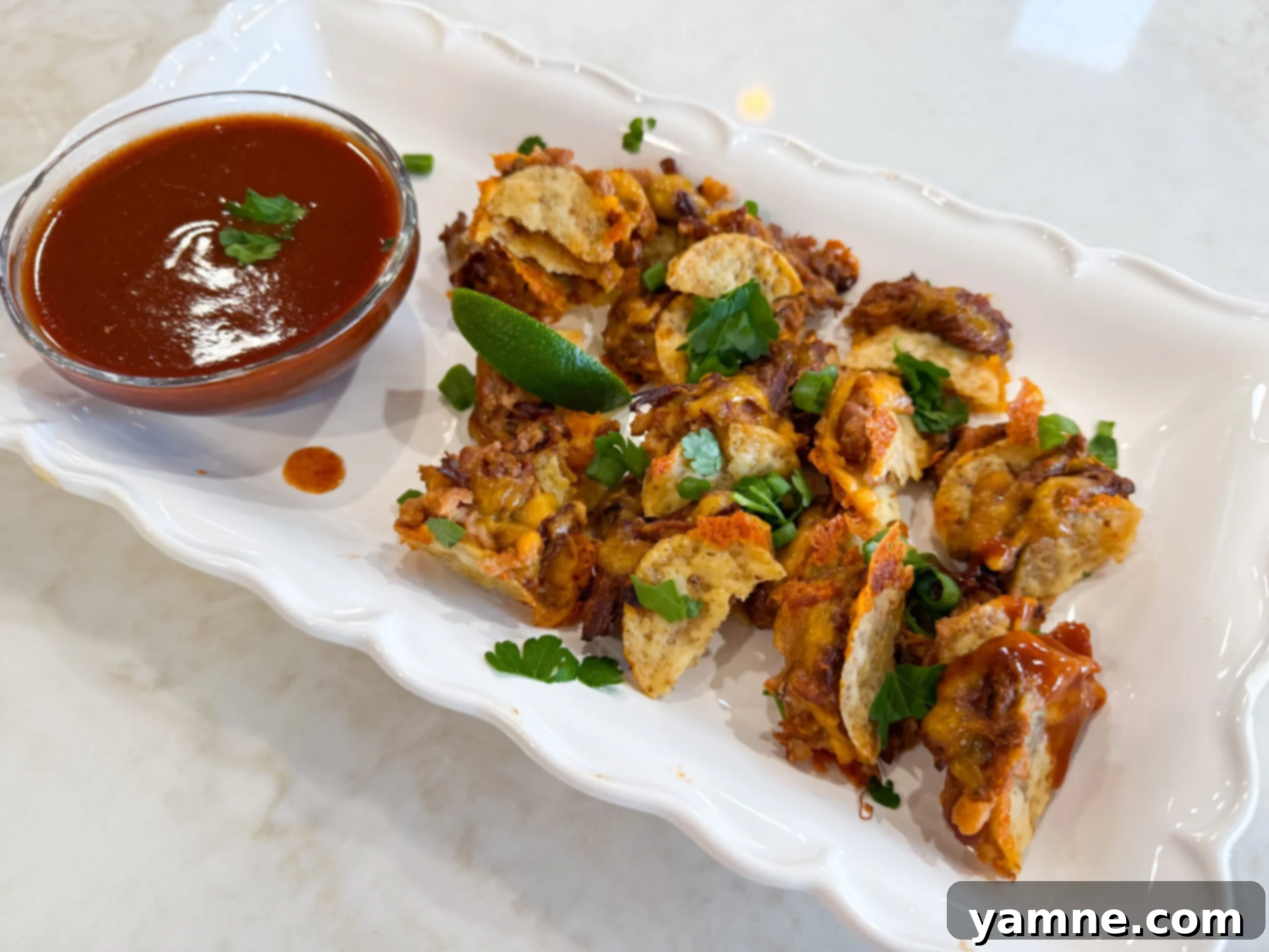Tortilla chip tacos served on a plate